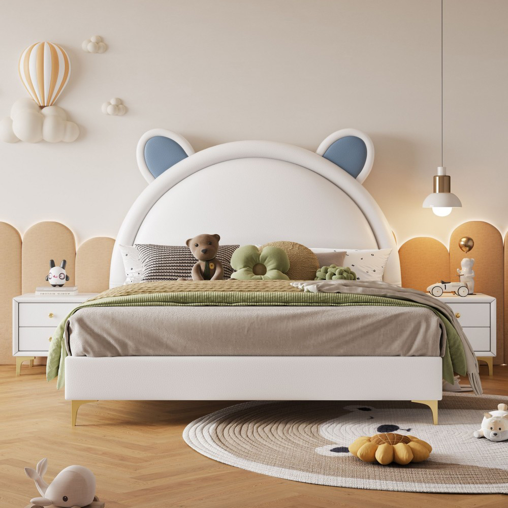 Cream-style children’s bed, featuring cartoon designs—perfect as a sin...