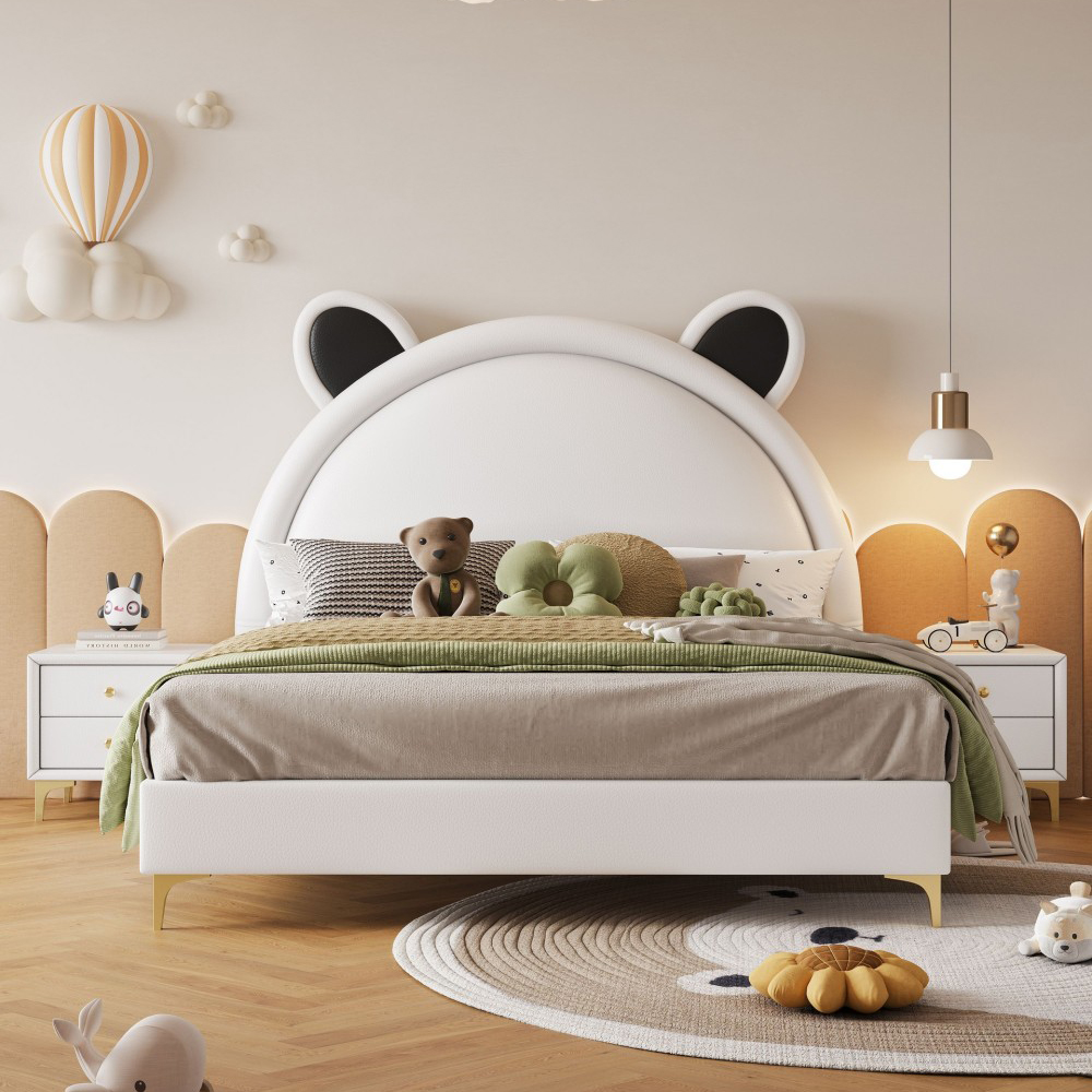 Cream-style children’s bed, featuring cartoon designs—perfect as a sin...